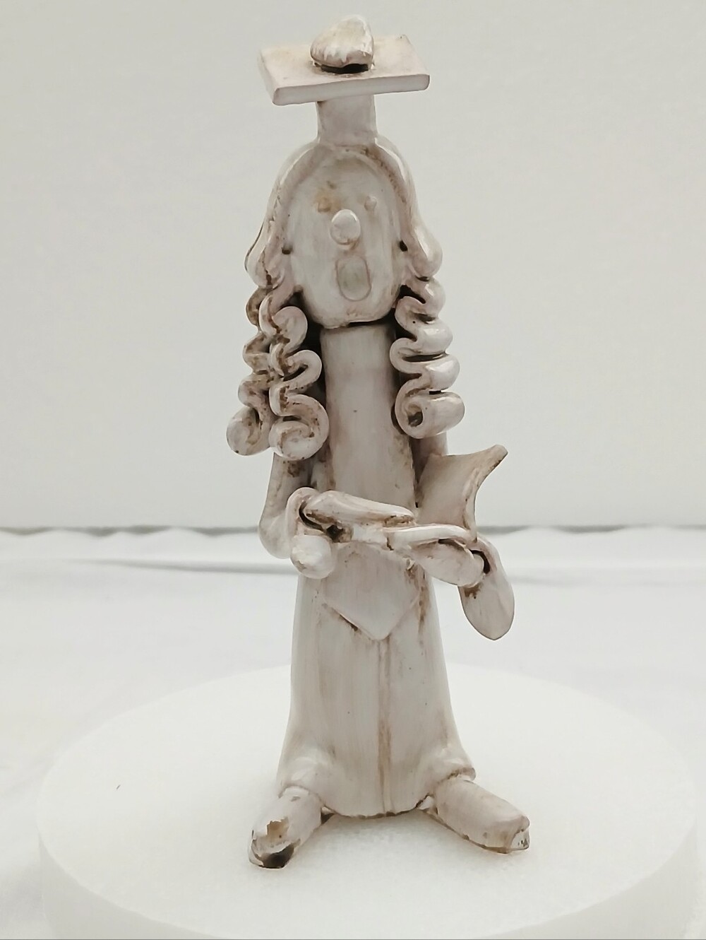 Vintage Lawyer Figurine in Robe with Curled Wig  Has Been Displayed in Cabinet